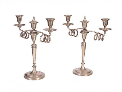 Couple of candelholders: Couple of silver candleholders with three flames, Italy, first half of XX century, weight about gr. 3000