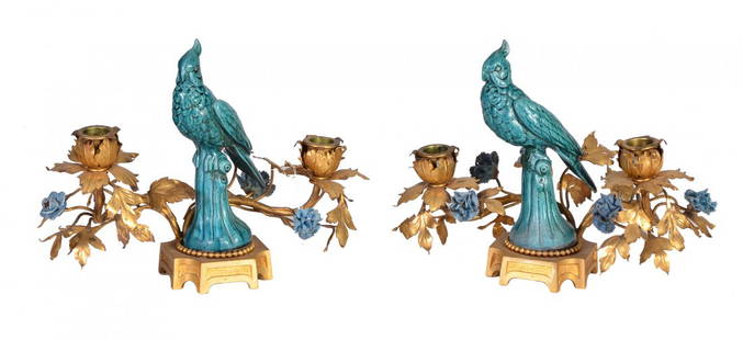 Couple of candelholders: Couple of candelholders with two arms made of golden bronze, garnished with parrot statues and flower of turquoise porcelain, H cm 20,5