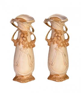 Couple of vases: Couple of vases of enamelled pottery marked Royal Dux Bohemia, early XX century, H cm 39