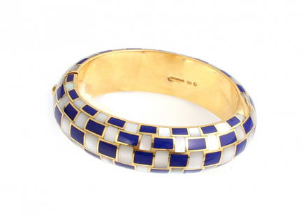 Tiffany: Bracelet made of yellow gold with enamelled garnishes and nacre, 1960's, weight gr.60