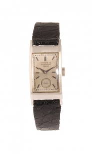 Patek Philippe: Rectangular only time watch made of platinum, particular case by Tiffany for Patek Philippe, with Maison certificate about the sale on october 1943, mm 40x20