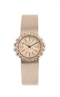 Patek Philippe: Jewel watch made of white gold, with crown of brilliants for ct 2,87, with certificate about the sale the 26th of september 1968, diameter about mm 28