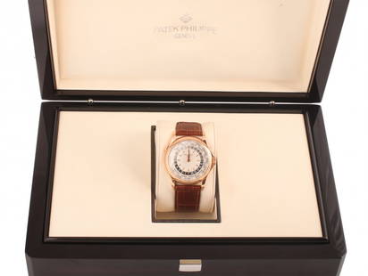 Patek Philippe: Le ore del mondo ref. 5110R-001 made of pink gold, opaline guilloche face with pink gold index, with box and certificate about the sale the 23rd of November 2004, diameter mm 35