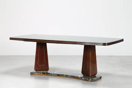 DASSI M.M.: DASSI M.M. Tavolo in pallisandro con piantone centrale e base in marmo, piano in vetro, produzione Mobili Dassi Lissone, anni 50. -. Cm 227,00 x 81,00 x 100,00.