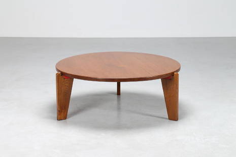 JEAN PROUVÉ Attrib. Wood circle little table and red: Attrib. Wood circle little table and red lacquered metal cross support, 60’s.. . Cm 101,00 x 38,50 x 101,00.