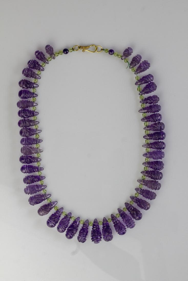 Carved amethysts and peridot necklace, gr 63.40, with (1 of 1)