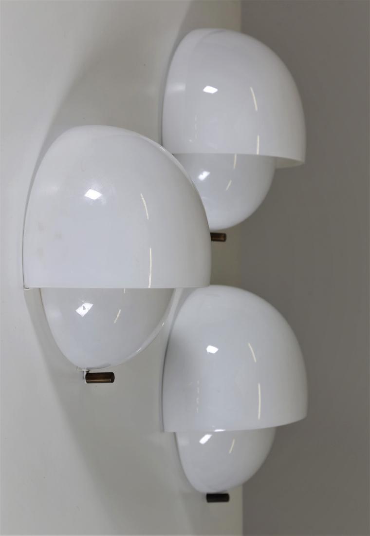 VICO MAGISTRETTI Three wall lamps in opal glass, (1 of 3)