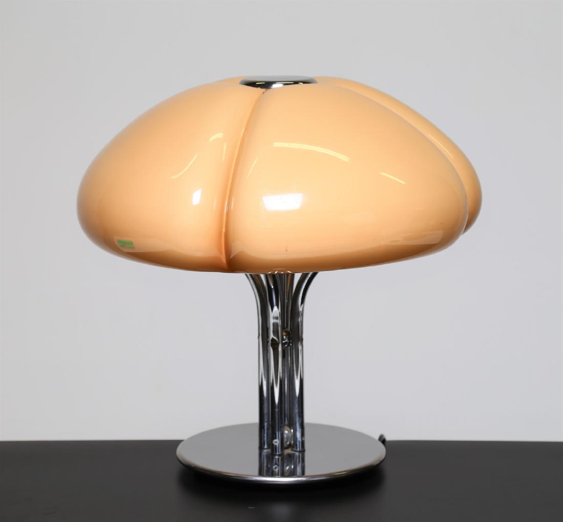 GAE AULENTI Chromed metal and perspex table lamp, mod.: Chromed metal and perspex table lamp, mod. Quadrifoglio for Harvey Guzzini, 1970s. . Cm 52,00 x 52,00 x 52,00.