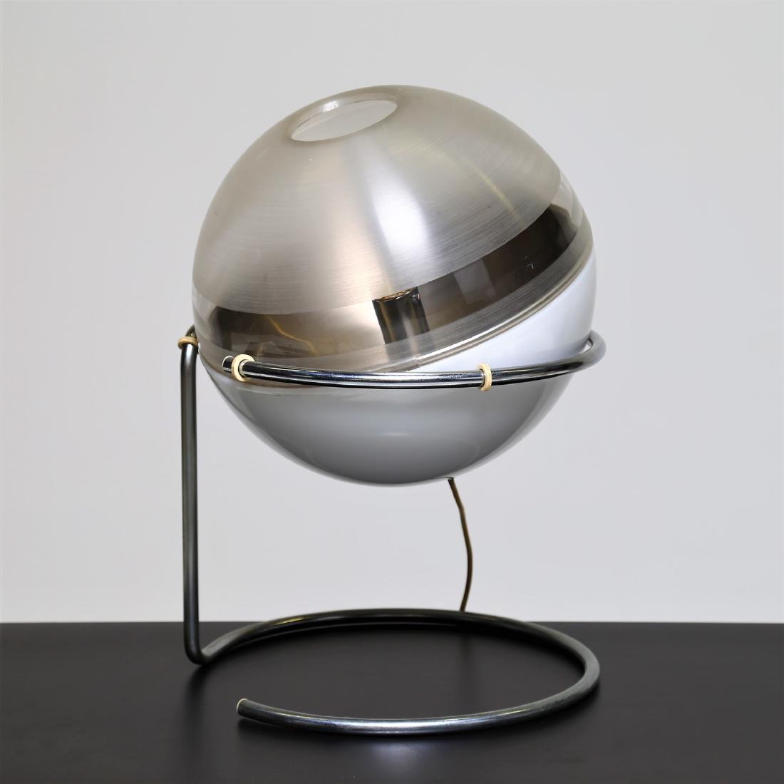 FABIO LENCI Steel and perspex table lamp, mod. Focus: Steel and perspex table lamp, mod. Focus for Harvey Guzzini, 1970. . Cm 37,00 x 60,00 x 37,00.