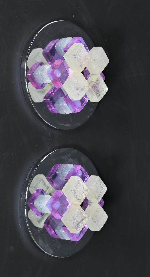 ANGELO BROTTO Pair of chromed metal and glass wall: Pair of chromed metal and glass wall lamps, for Esperia, 1960s. . Cm 30,00 x 30,00 x 11,00.