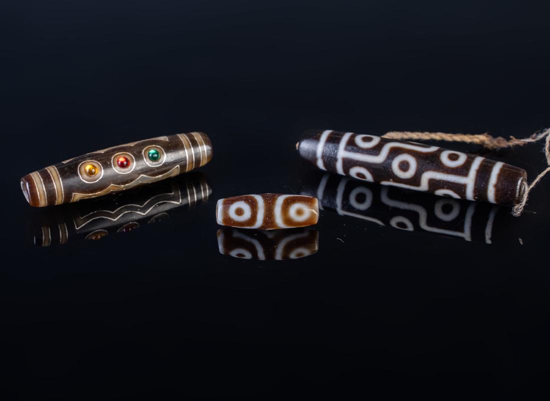 Arte Himalayana  A group of three agate dzi . (1 of 3)