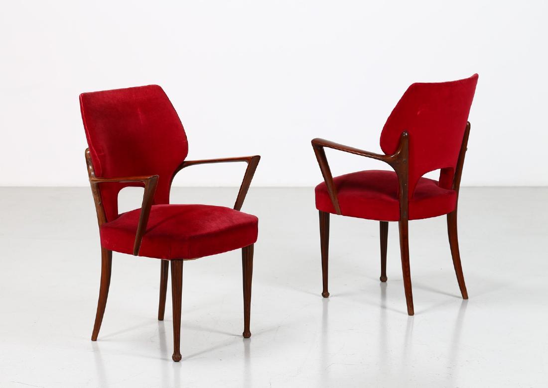 JANNACE & KOVACS Coppia di poltroncine, anni 50.: Coppia di poltroncine, anni 50. . Cm 58,00 x 87,00 x 55,00. Legno di palissandro e tessuto