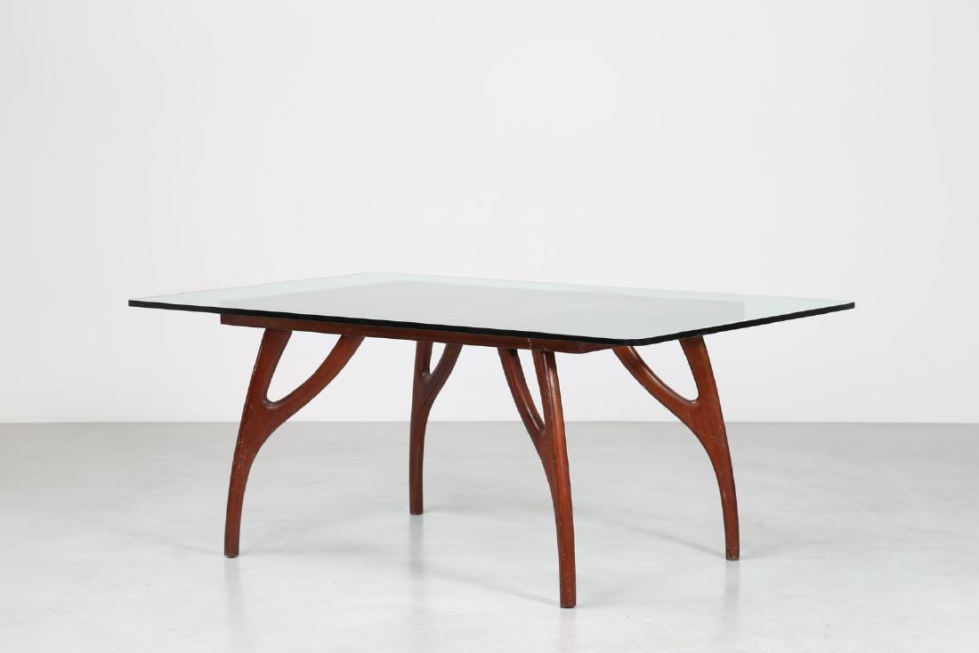 ADRIAN PEARSALL Distinctive mahogany table with glass: Distinctive mahogany table with glass top, 1950s. . Cm 180,00 x 77,00 x 120,00. Glass chipped at the edge