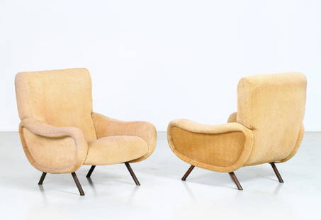 MARCO ZANUSO Pair of armchairs mod. Lady.: Pair of armchairs mod. Lady. . Cm 80,00 x 82,00 x 80,00. Metal and fabric, for Arflex, 1951