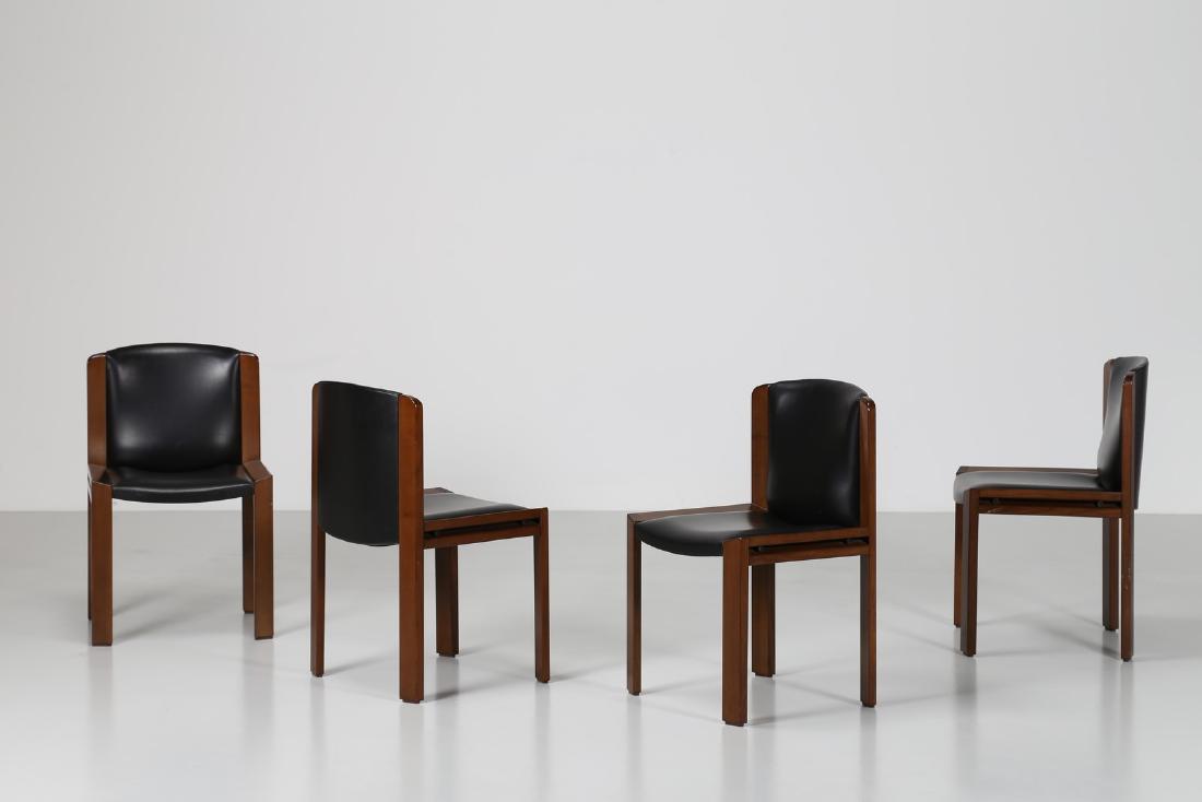 JOE COLOMBO Four chairs.: Four chairs. Walnut and leather. Cm 48,50 x 78,50 x 49,00. Walnut wood structure, leather upholstery and upholstery. Model 300, produced by Pozzi, 1965.Publications; Joe Colombo 1930-1971, Gianni Colo
