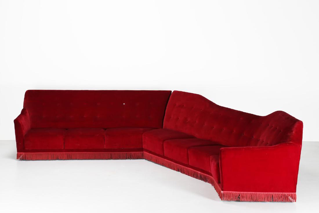 MELCHIORRE BEGA Big angular sofÃ .: Big angular sofÃ . Wood and fabric. Cm 350,00 x 94,00 x 320,00. Wooden frame, padding and original fabric. As part of the furnishings of a villa designed by the architect Melchiorre Bega in 1948 on 
