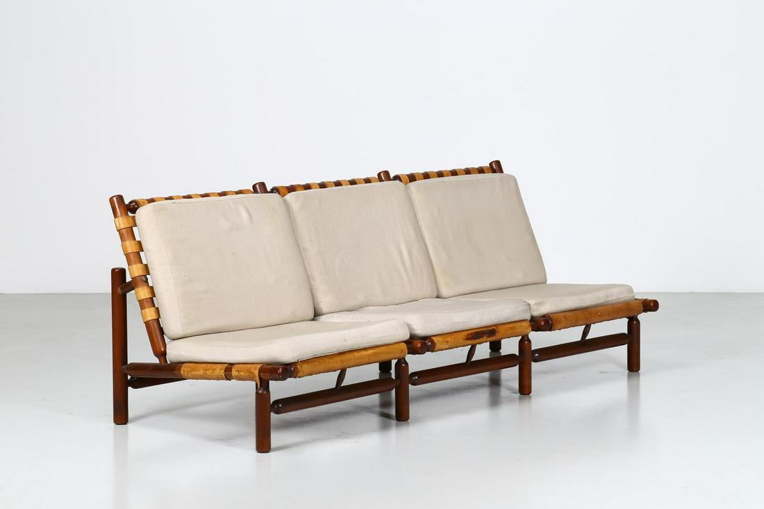 ILMARI TAPIOVAARA Sofa.: Sofa. Wood and leather. Cm 200,00 x 76,00 x 80,00. Three-seater teak and interlaced leather sofa, produced by La Permanente Mobili CantÃ¹, Italy 1957. Design presented at the "Second Selective Exhib