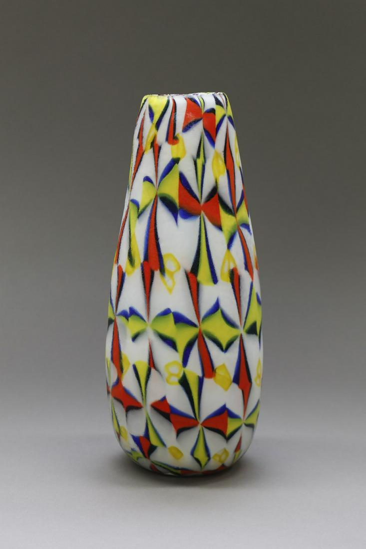 FRATELLI TOSO Vase from Stellati series by Pollio Perel: FRATELLI TOSO Vase from Stellati series by Pollio Perelda with multicolored murrine and lattimo base, 60s. Bibliografia: Hereimans M.,Toso C., Fratelli Toso Murano 1902-1980, Arnoldsche, 2017, p. 129.