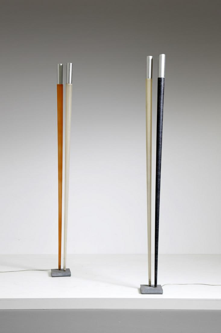 VIABIZZUNO Pair of standard lamp, 80s.: Pair of standard lamp, 80s. Plastic and painted metal material.. Cm 20,00 x 220,00 x 20,00. Manufacturing brand.