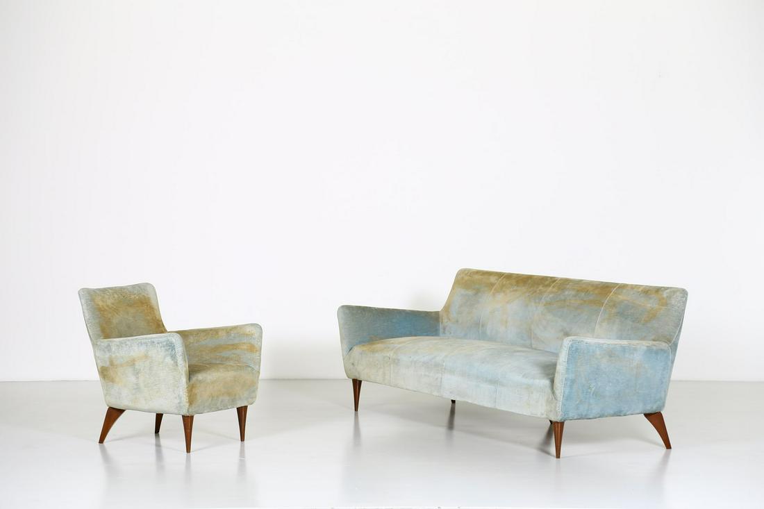 RENZO FRANCHI Sofa and armchair, 50s. (2).: Sofa and armchair, 50s. (2). Wood and padding velvet.. Cm 210,00 x 80,00 x 70,00. Armchair: 80x71x90 cm. Literature (armchair): Il libro dell'Arredamento, a cura della Rivista dell'Arredamento, Gorlic