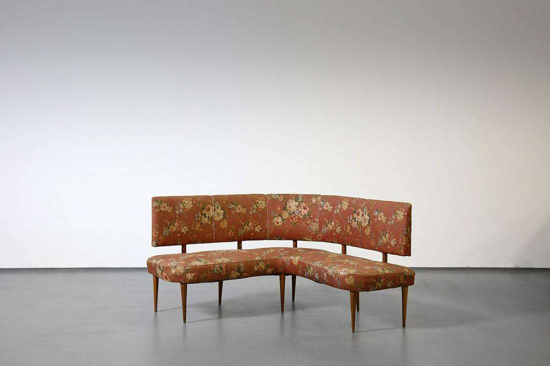 FEDERICO MUNARI 1950s curved sofa..: 1950s curved sofa.. Beech and padding fabric.. Cm 130,00 x 80,00 x 140,00. Manufacturing brand.