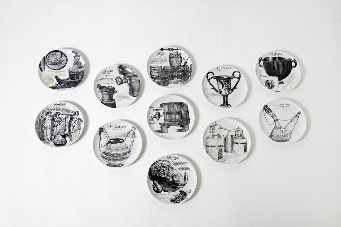 PIERO FORNASETTI Set of eleven plates for Martini & (1 of 2)