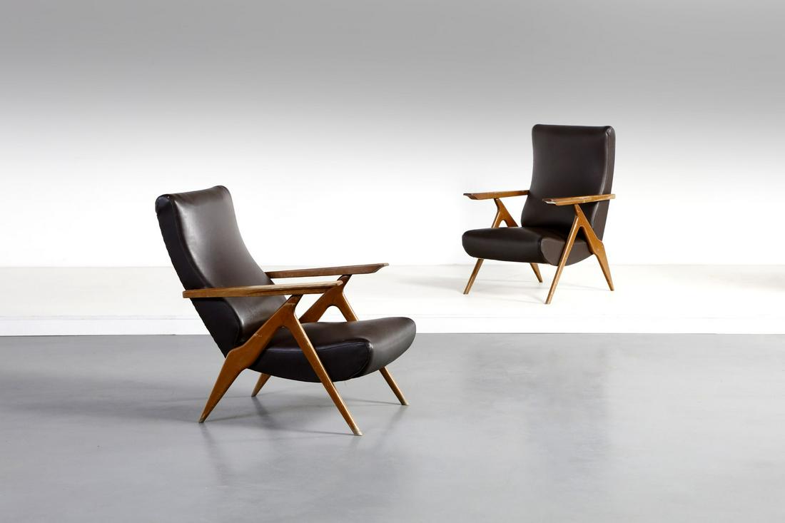 MANIFATTURA ITALIANA Pair of armchairs.: ITALIAN WORK Pair of armchairs. Wood and padding skai.. Cm 62,00 x 92,00 x 73,00. 1960s.