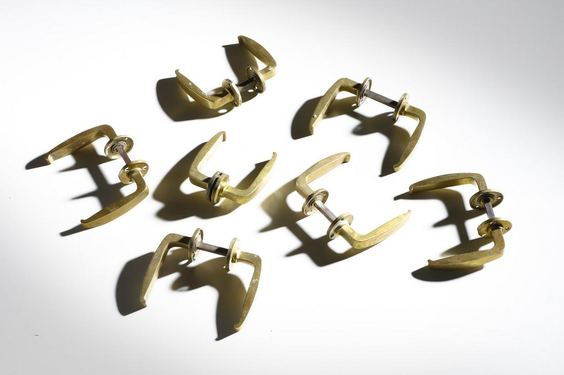 MANIFATTURA ITALIANA Seven pair of handles.: ITALIAN WORK Seven pair of handles. Brass.. Cm 13,50 x 4,50 x 12,00. 1960s.