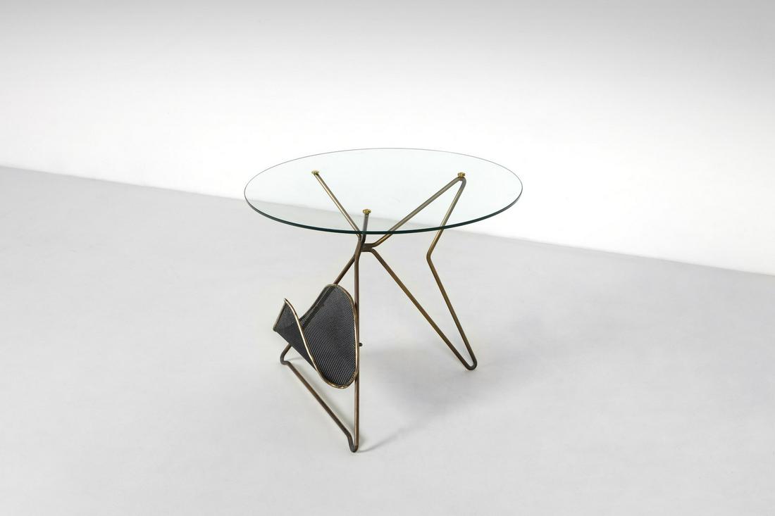 MANIFATTURA ITALIANA Coffee table with magazine rack.: ITALIAN WORK Coffee table with magazine rack. Glass, lacquered metal and brass.. Cm 55,00 x 44,00 x 55,00. 1950s.