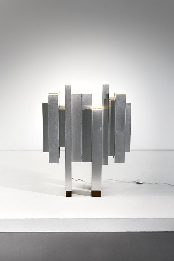 FABRIZIO COCCHIA GIANFRANCO FINI & attributed. Floor: attributed. Floor lamp/table lamp for Newlamp, Rome. 1970. Aluminum, walnut and plexiglass.. Cm 70,00 x 92,00 x 28,00.