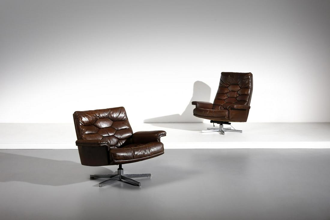 DE SEDE Pair of armchairs.: DE SEDE Pair of armchairs. 1970. Metal, leather. Cm 74,00 x 70,00 x 70,00. Large:94 x 74 x 70 cm