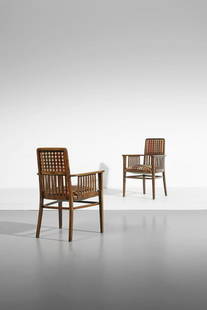 JOSEF HOFFMANN Pair of armchairs for Jacob & Josef Kohn.: Pair of armchairs for Jacob & Josef Kohn. Wood and padded fabric.. Cm 60,00 x 93,00 x 59,00. Early twentieth century. Literature:Borsi F., Perizzi A., Josef Hoffmann, Tempo e geometria, Officina edizi