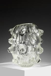 ERCOLE BAROVIER Large vase with mugnoni in colorless glass, decorated with large hemispherical: Large vase with mugnoni in colorless glass, decorated with large hemispherical reliefs containing air bubbles. 1938. Murano glass.. Cm 30,00 x 35,00. Literature: Attilia Dorigato, Lâ€™arte dei