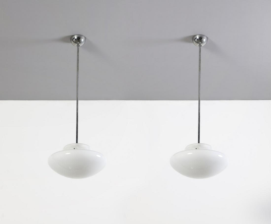 MANIFATTURA ITALIANA Pair of wall lamps.: ITALIAN WORK Pair of wall lamps. Opal glass and painted metal.. . 1960s.