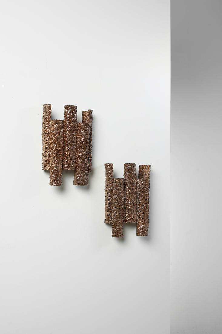 AIMO TUKIAINEN Pair of appliques. (1 of 2)