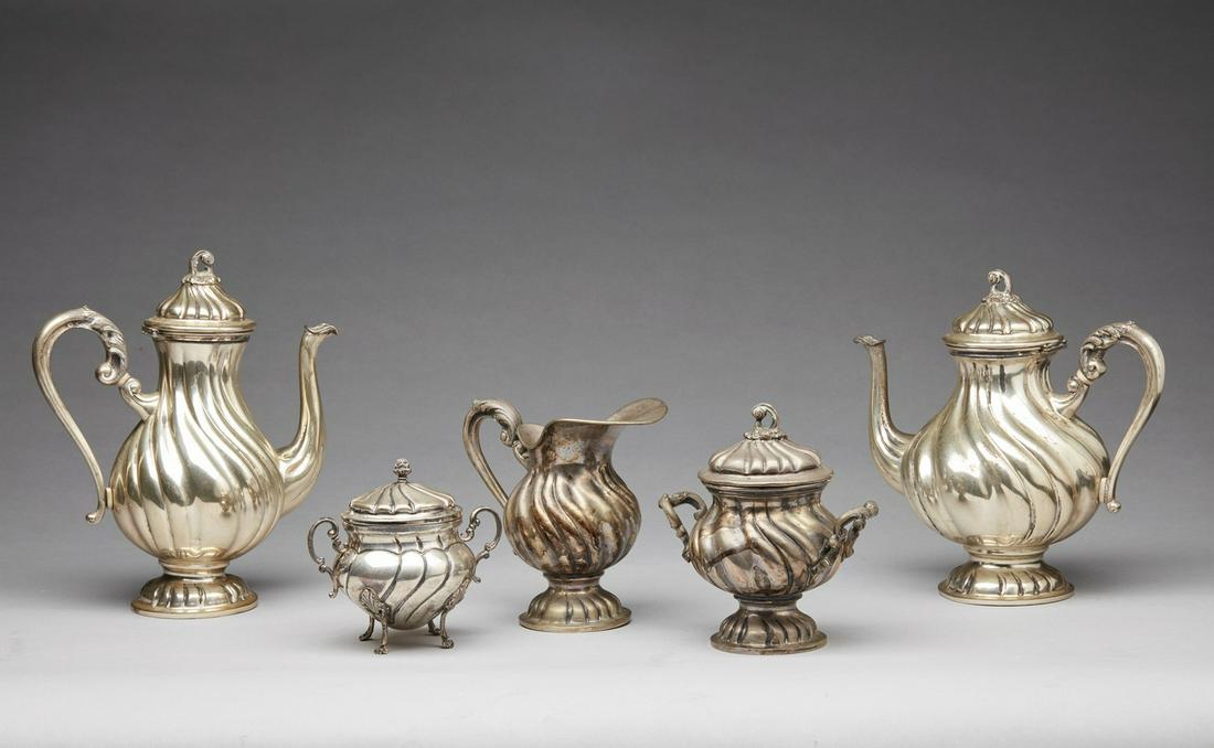 ARGENTIERE ITALIANO DEL XX SECOLO  A silver service consisting of two coffee pots, two milk jugs and (1 of 8)