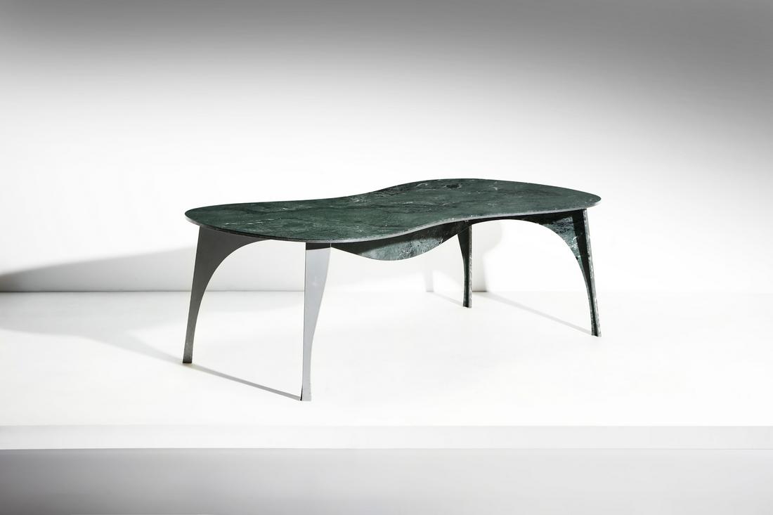 RON ARAD Boat Eye Table per Bigelli Marmi.: RON Boat Eye Table per Bigelli Marmi. 1999. Marmo verde delle Alpi, alluminio corrugato e alluminio.. Cm 218,00 x 74,00 x 118,00. Il tavolo Boat Eye Table Ã¨ costituito da una sottile lastra di marm