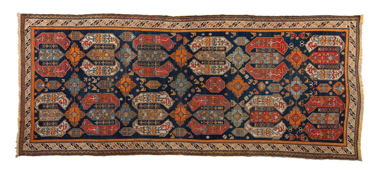 DAGHESTAN A carpet with geometric decorations and medallions on a blue background, Caucasus, around (1 of 2)