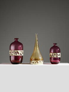 ANGELO BROTTO Three vases.: Three vases. Brass and glass.. Cm 15,00 x 30,00. 1970s.Yellow: 35 x 25 cmSmall, purple: 24 x 12 cm