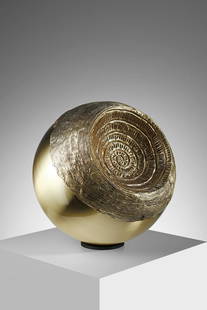 ANGELO BROTTO Sphere.: Sphere. Gold-plated brass.. Cm 30,00 x 30,00 x 30,00. Signature of the author engraved at the base, 1970s.