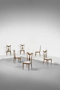 EUGENIO QUARTI Six chairs.: Six chairs. Walnut and padded fabric.. Cm 43,00 x 98,00 x 43,00. 1950s.