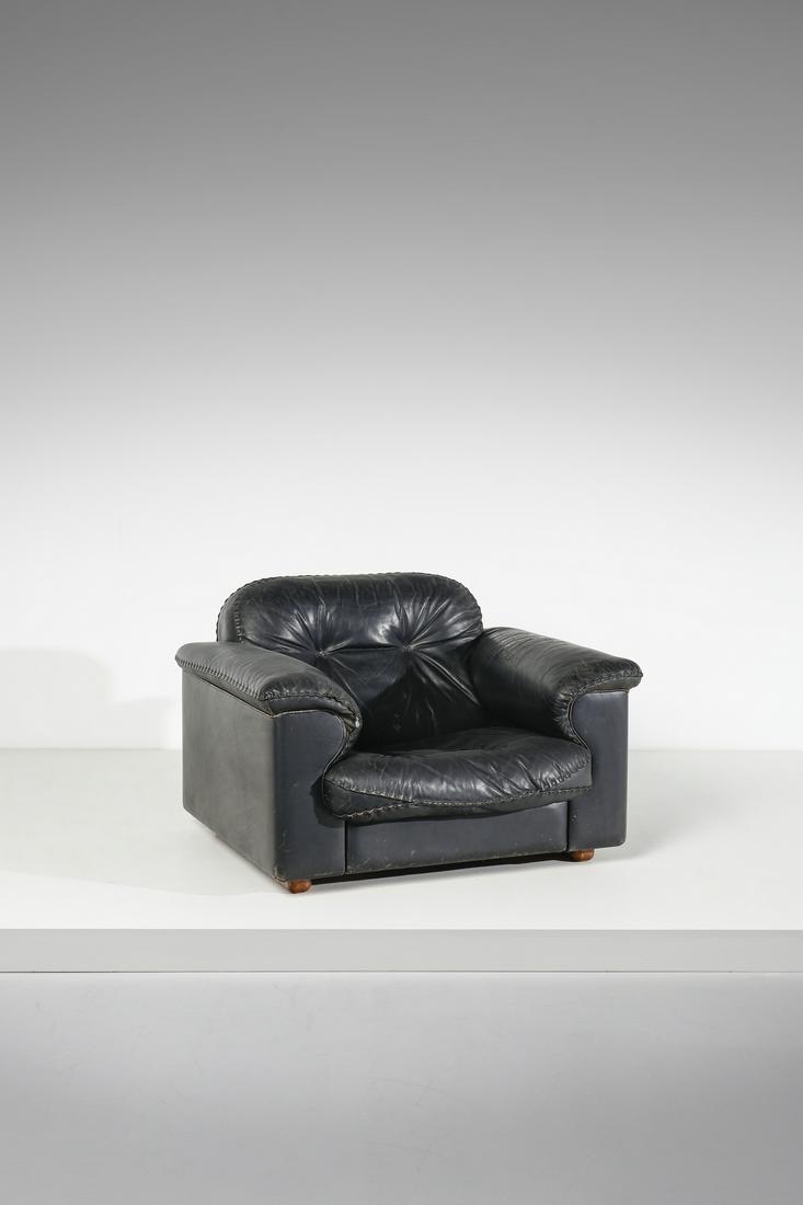 DE SEDE Armchair.: DE SEDE Armchair. Wood and leather.. Cm 107,00 x 67,00 x 85,00. 1970s
