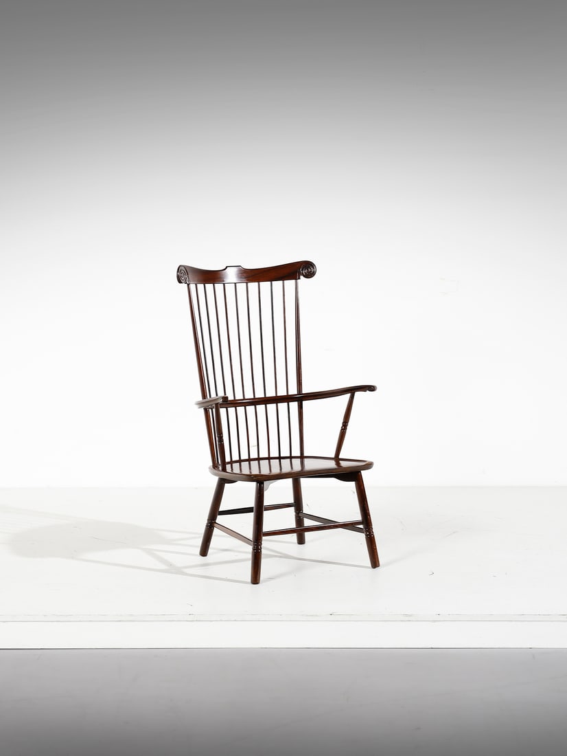PAOLO BUFFA Armchair with "rods" back for Marelli & Colico.: Armchair with "rods" back for Marelli & Colico. 1946. Rosewood.. Cm 60,00 x 100,00 x 50,00. Literature: Domus n 226, gennaio-febbraio 1948, p. 57; R. Aloi, Lâ€™arredamento moderno, Hoepli, Milano