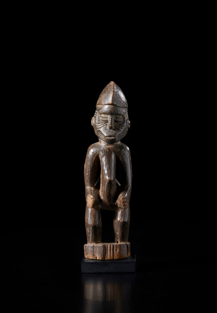 Senufo - Costa d'Avorio/Mali  Anthropomorphic sculpture.Hardwood with dark patina. . (1 of 4)