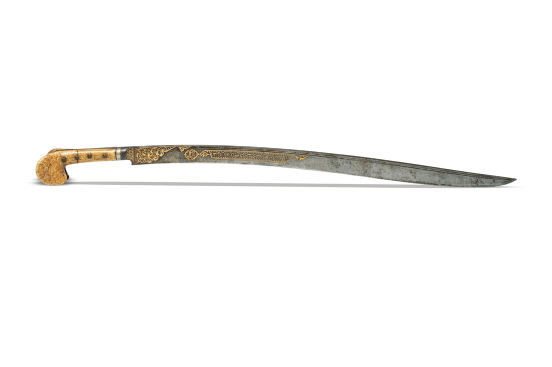 . Yatagan Islamic sword.Turkey, 18th.: . Yatagan Islamic sword.Turkey, 18th. . Cm 80,00. Beautiful specimen of the Yatagan, a sword used by the Ottoman Empire around the 18th century. The steel blade has beautiful golden decorations and th