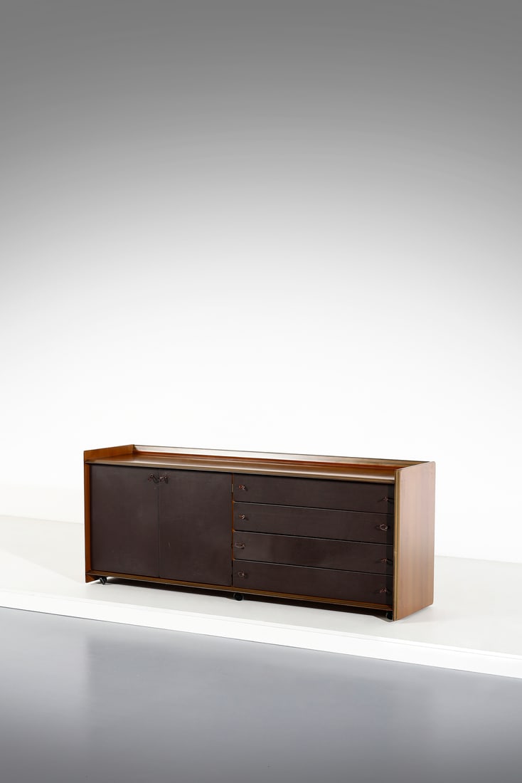 AFRA (1937-2011) & TOBIA (n. 1935) SCARPA Sideboard on wheels from the Artona series for Maxalto,: SCARPA AFRA (1937-2011) & TOBIA (n. 1935) Sideboard on wheels from the Artona series for Maxalto, Italy. 1975. Wood and leather.. Cm 180,00 x 72,00 x 44,00.