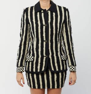 GIANNI VERSACE Striped ivory white and black suit.: VERSACE GIANNI (1946 - 1997) Striped ivory white and black suit. 1990. . . Vintage Gianni Versace Couture suit, consisting of jacket and mini skirt. Jacket in bouclée textured wool fabric with ivory