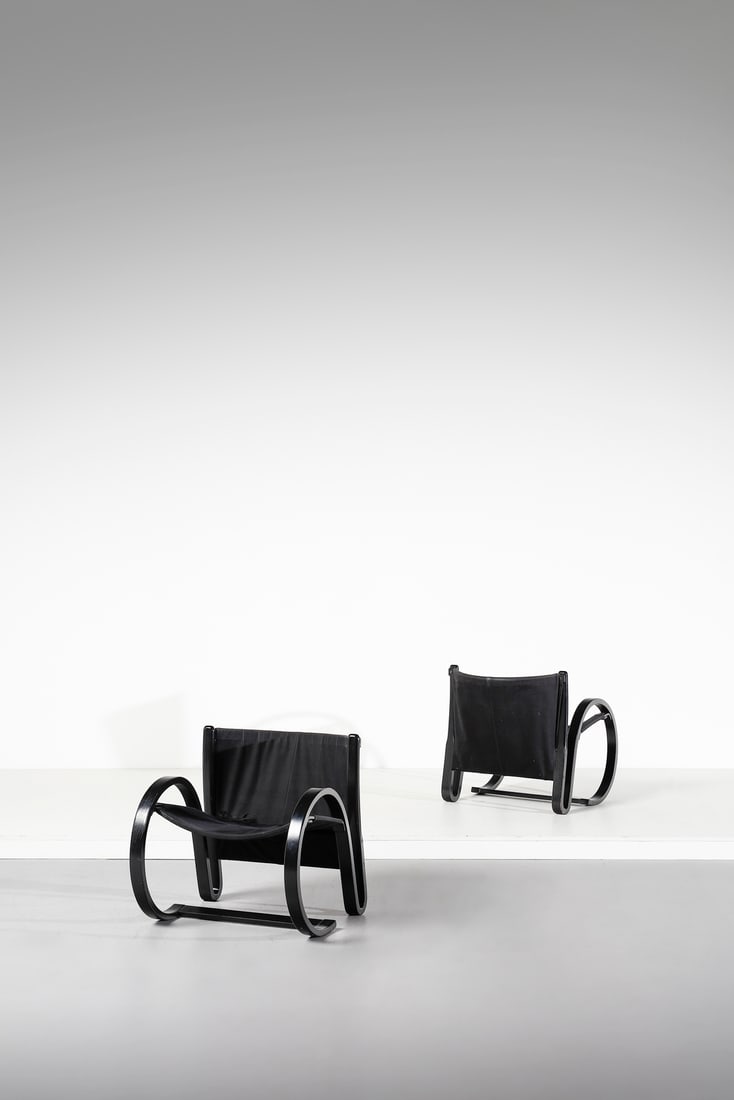 CARLO BERRUTI You and Me pair of armchairs for Damber, Italy.: You and Me pair of armchairs for Damber, Italy. Lacquered bent beech wood and fabric.. Cm 65,00 x 70,00 x 70,00. 1970s.