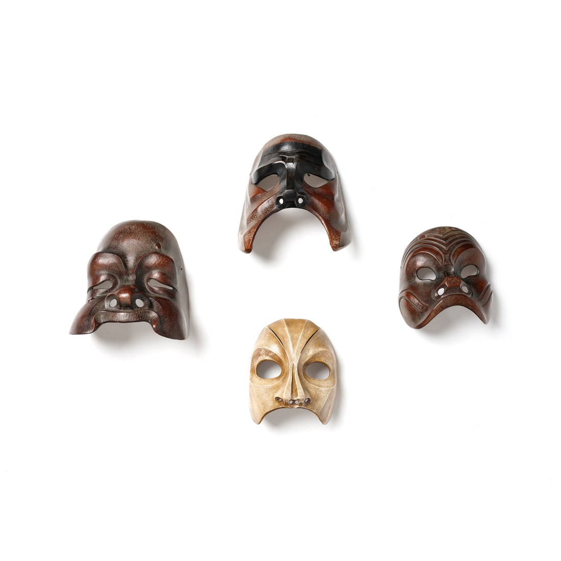 AMLETO SARTORI Four theater masks produced by the Centro Maschere e Strutture Gestuali. (1 of 2)