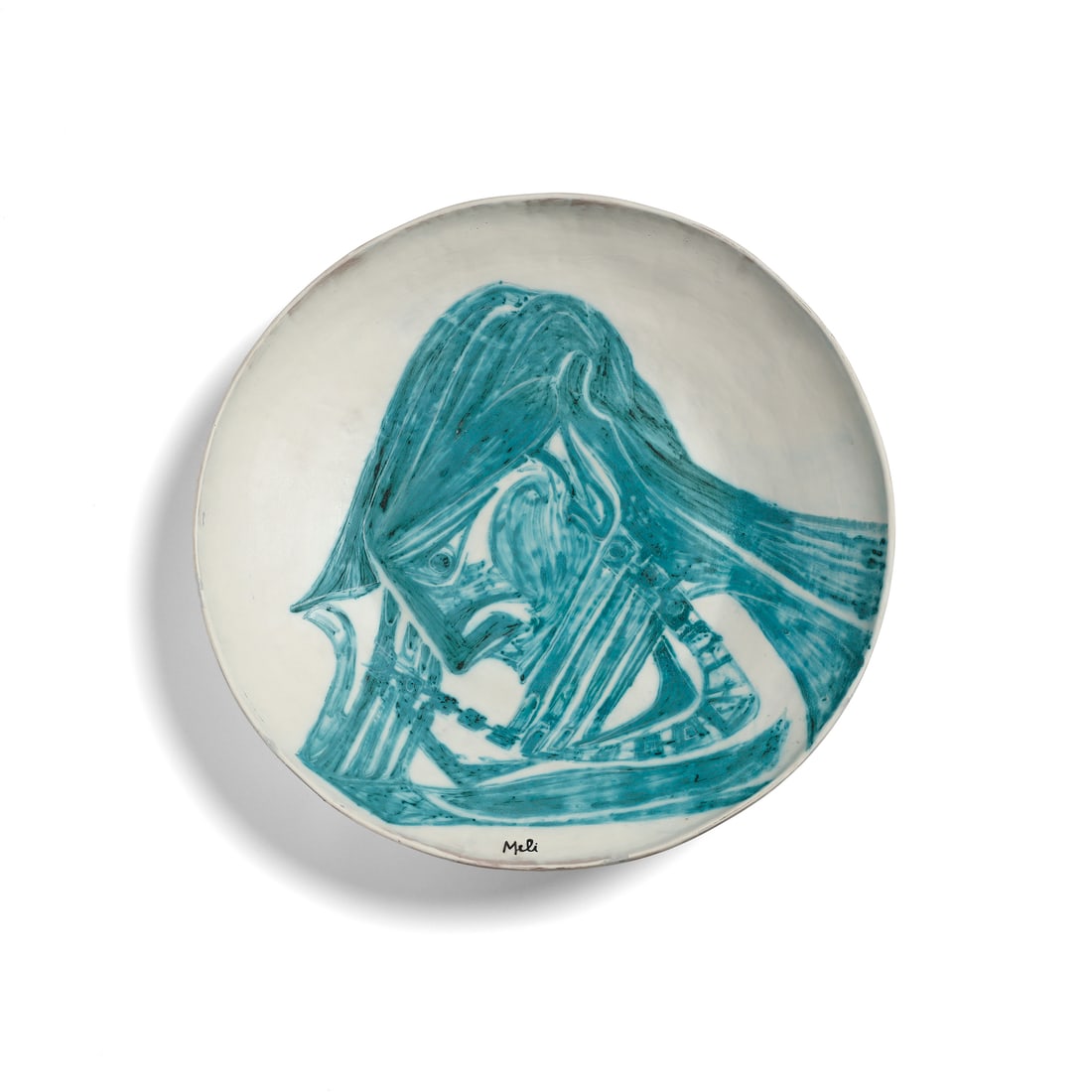 SALVATORE MELI Large centerpiece decorated with a male face.: MELI SALVATORE (1929 - 2011) Large centerpiece decorated with a male face. Terracotta painted in turquoise on a white background.. Cm 56,00 x 10,00 x 56,00. 1950s.Signature on the recto.